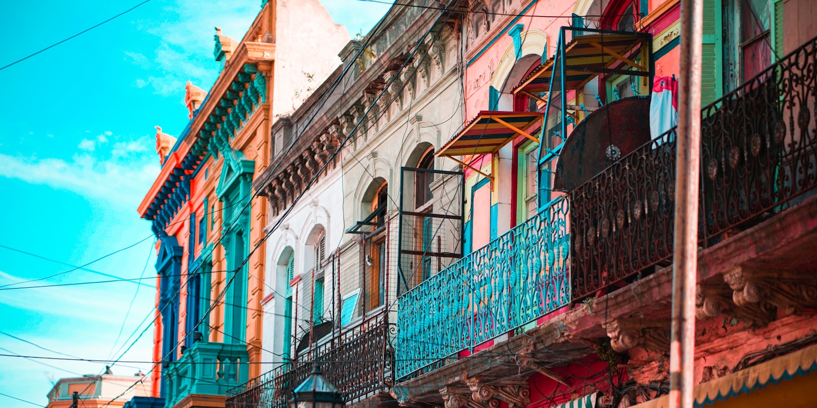 Colourful buildings of La Boca in Buenos Aires under a bright sky, a classic first stop for travellers arriving in Argentina