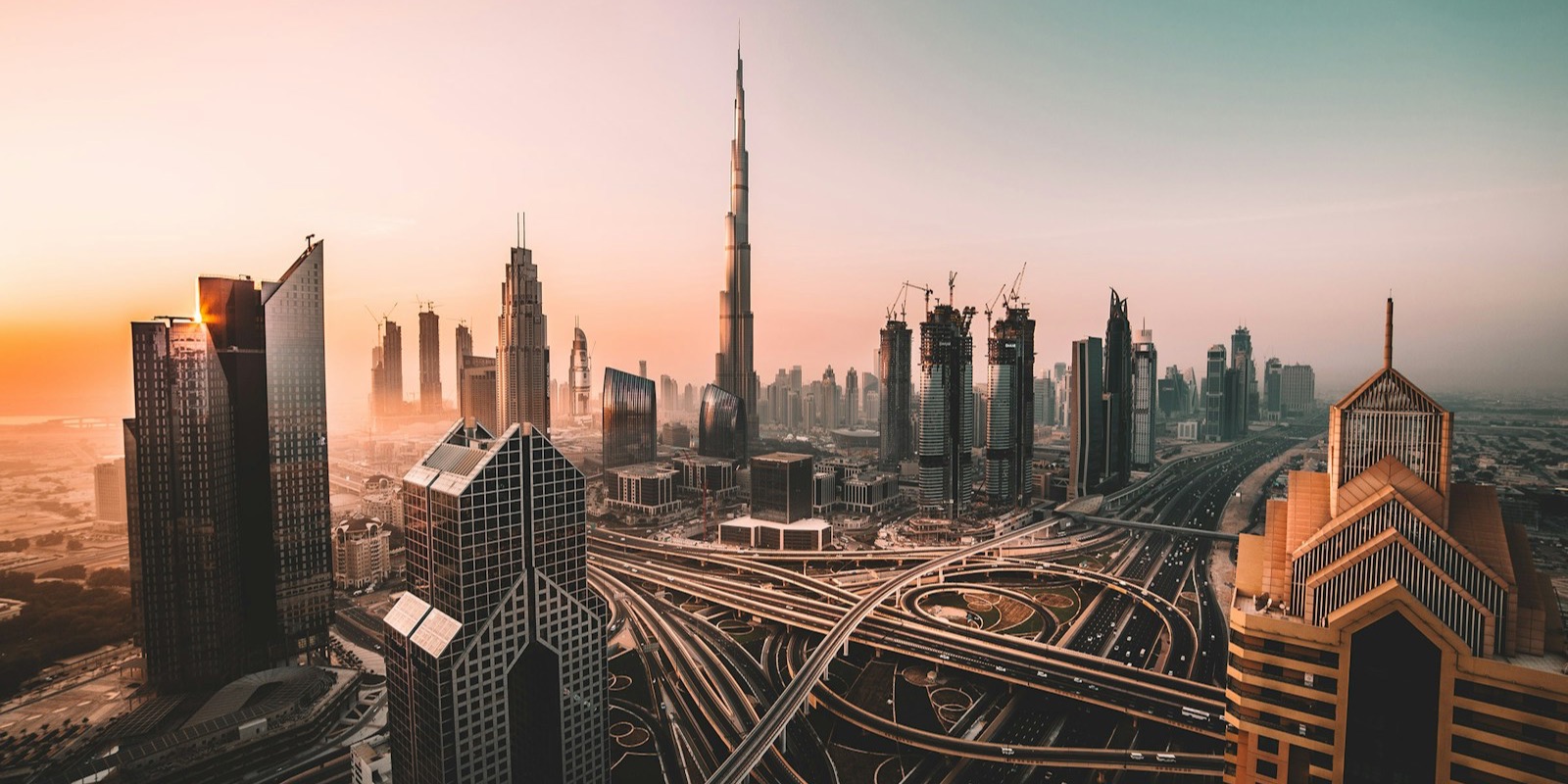 Aerial view of Dubai's highways and high-rise skyline