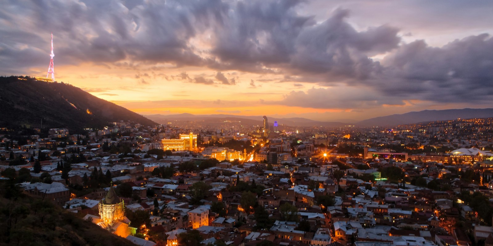 Rooftops of Tbilisi's old town under a cloudy sky, Georgia