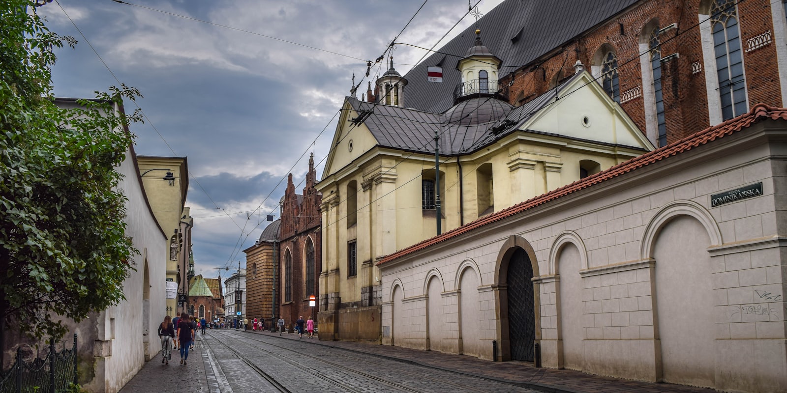 A cobblestone street lined with old buildings in a European old town